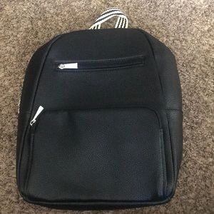 Thirty-one black leather backpack